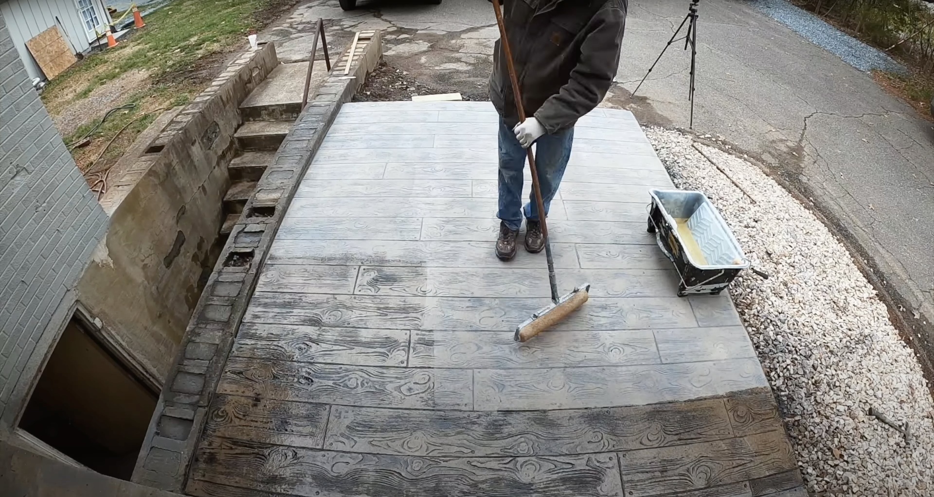 Stamped concrete patio with wood-grain pattern and professional finishing