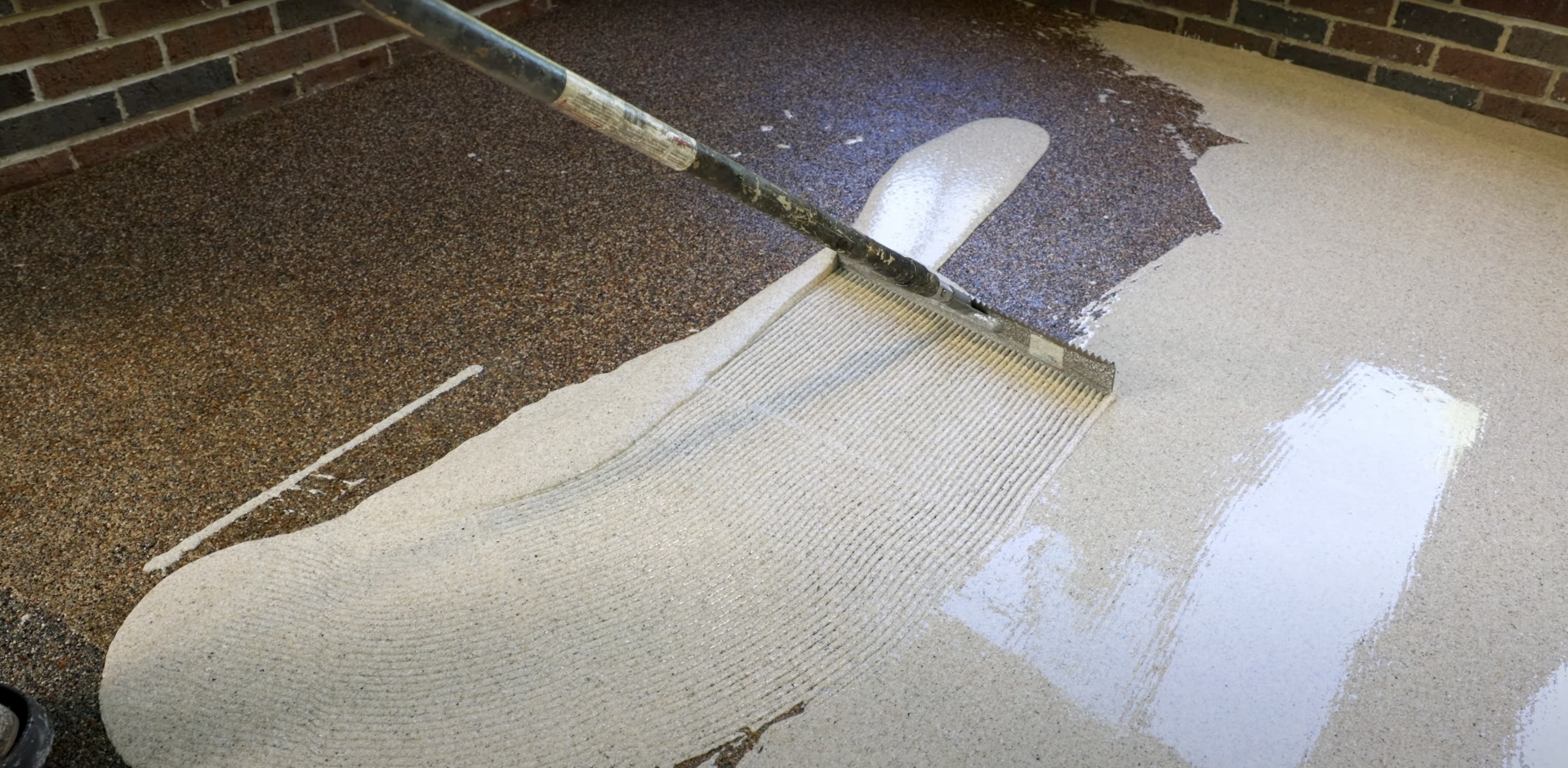 Professional concrete contractor working on driveway installation in Thornton, CO