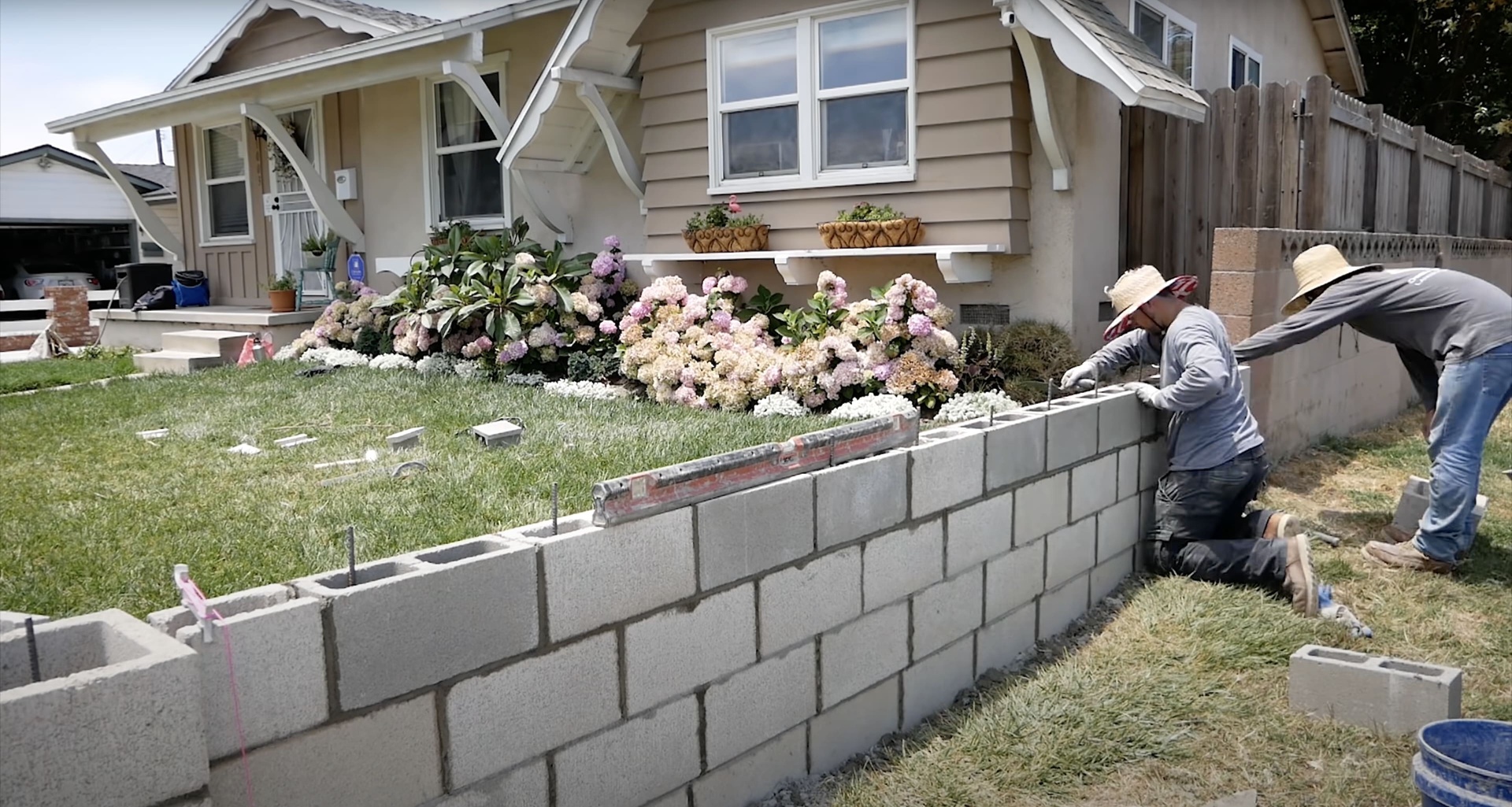 Concrete masonry work with professional crew installing concrete blocks