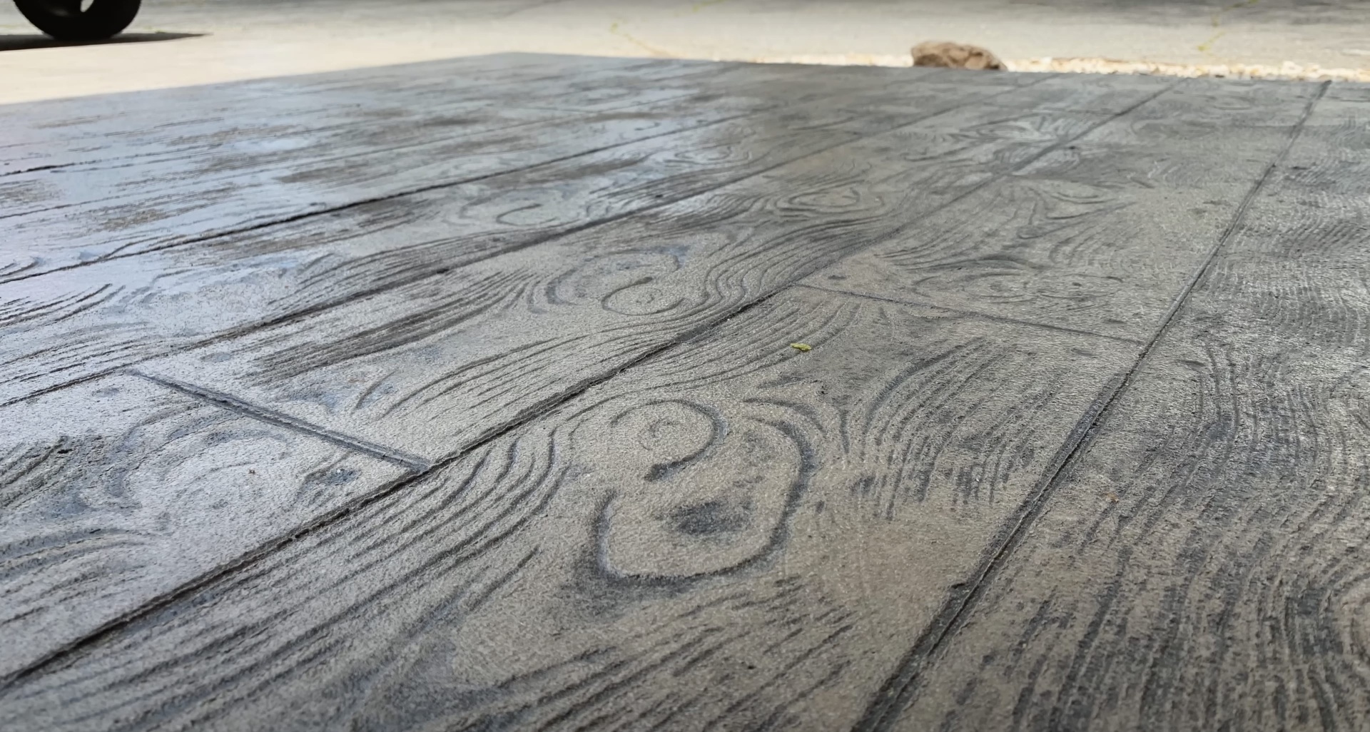 Stamped concrete with detailed wood grain texture and professional craftsmanship