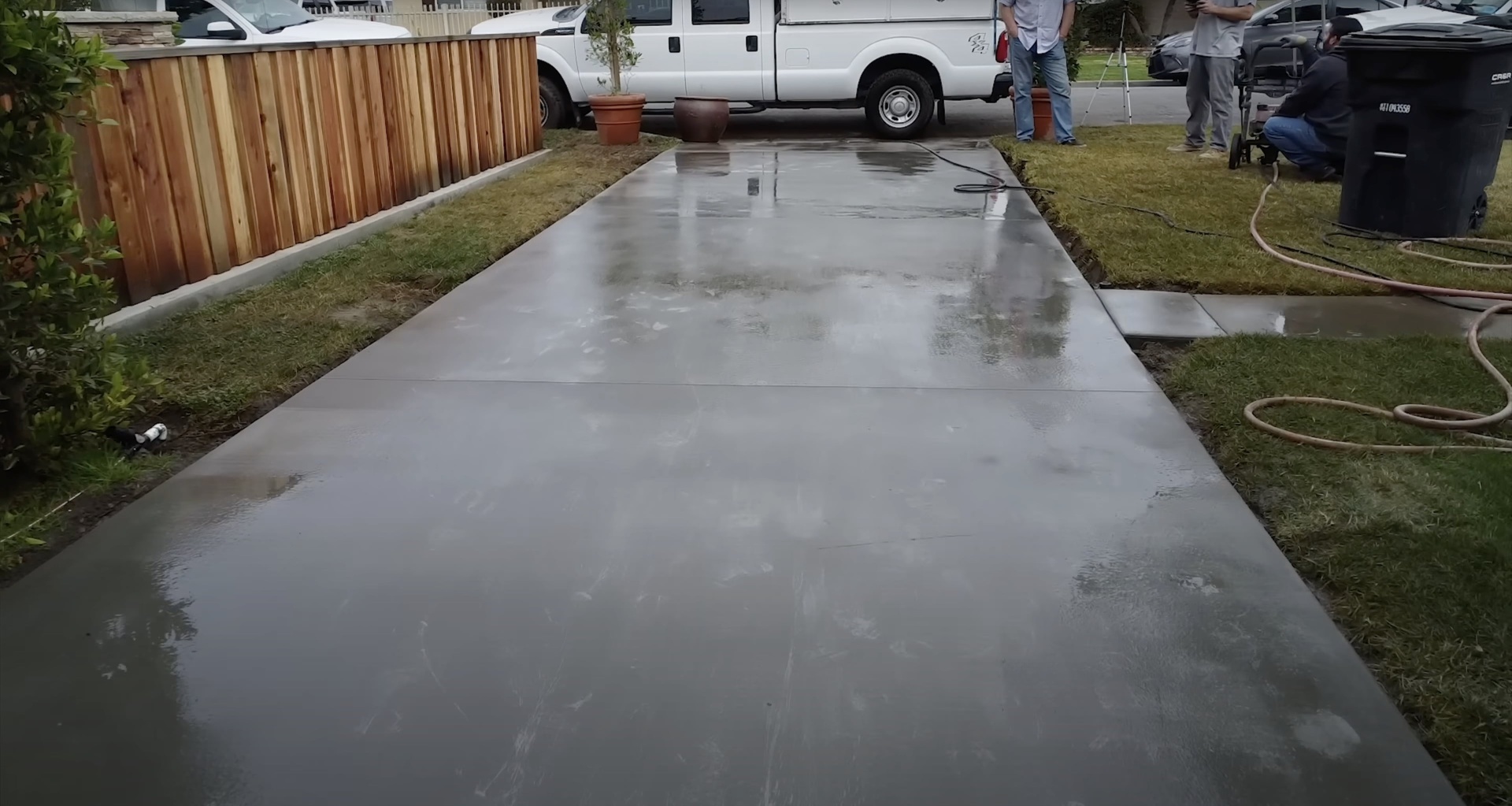 Concrete patio construction project showing professional finishing work
